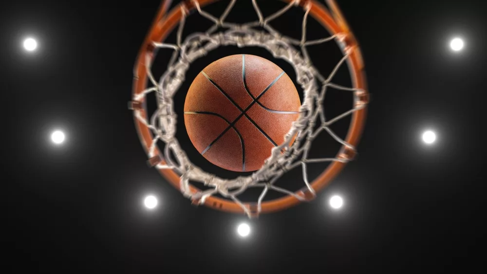 3d rendering basketball on hoop and lighting from roof stadium