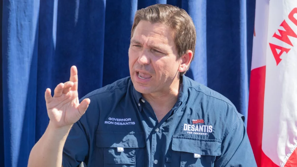 Florida Republican Governor and presidential candidate Ron DeSantis greets supporters at the Iowa State Fair fair side chats in Des Moines^ Iowan August 12^ 2023