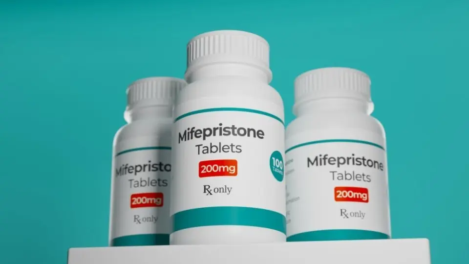 Mifepristone tablets in bottle. RU-486 Medical abortion pills. Used in combination with misoprostol. 3D illustration.