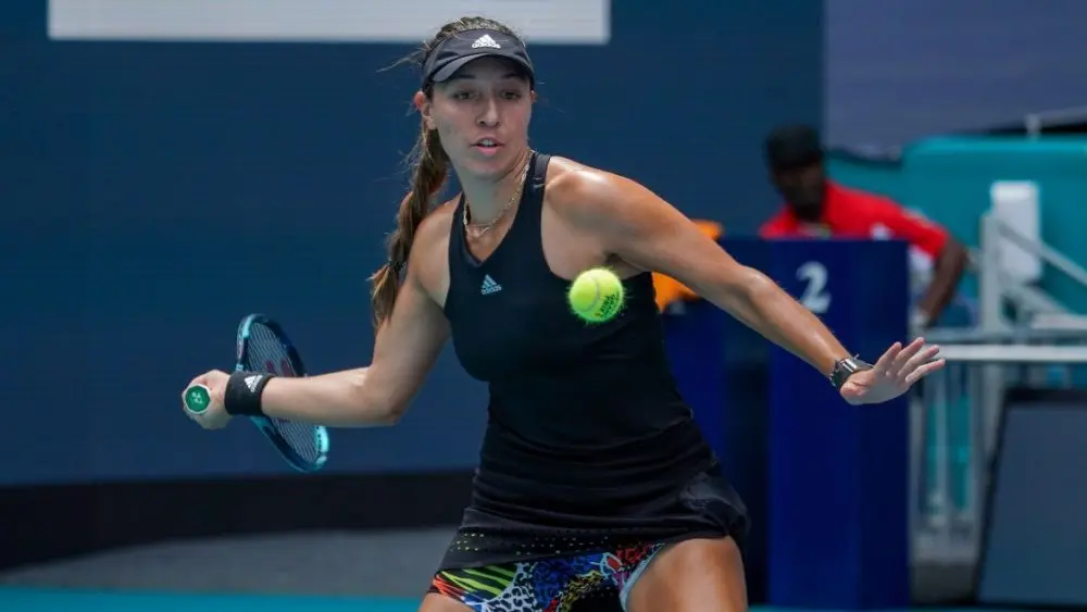 Professional tennis player Jessica Pegula of USA in action during Miami Open 2022 quarter-final match at the Hard Rock Stadium in Miami Gardens^ Florida MIAMI GARDENS^ FLORIDA - MARCH 30^ 2022