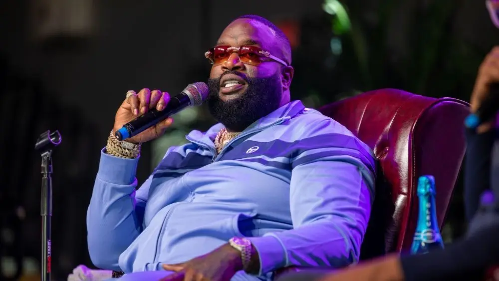 Rick Ross speaking with President A. Zachary Faison Jr. and Guest Host at Edward Waters University JACKSONVILLE FLORIDA - NOVEMBER 3^ 2022