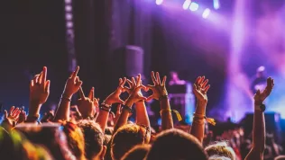 crowd partying stage lights live concert summer music festival