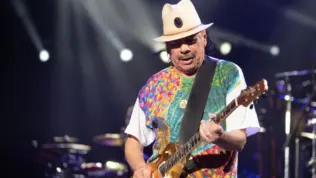 Carlos Santana performs on stage at the iThink Financial Amphitheatre. WEST PALM BEACH^ FLORIDA - AUGUST 22^ 2022
