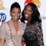 Monica^ Brandy Norwood arrives at the 2011 Pre-GRAMMY Gala And Salute To Industry Icons at Beverly Hilton Hotel on February 12^ 2011 in Beverly Hills^ CA