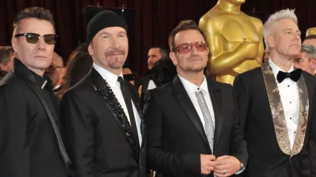 U2 with Bono & The Edge at the 86th Annual Academy Awards at the Hollywood & Highland Theatre^ Hollywood. LOS ANGELES^ CA - MARCH 2^ 2014