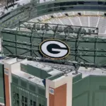 Feb 20^ 2025-Green Bay^ WI; An aerial view of Lambeau Field shows the iconic^ bowl-shaped stadium with its vast seating for 81^441 fans.
