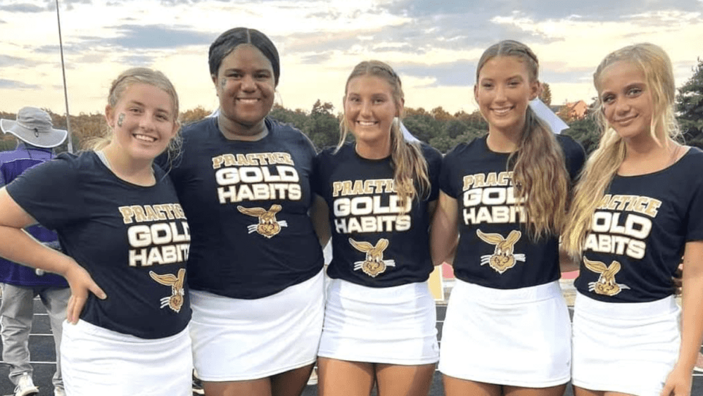 Five Somerset basketball players are also cheerleading this season