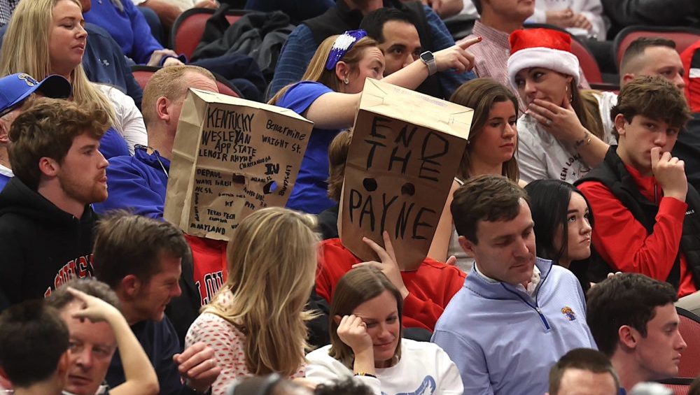 u-of-l-fans-with-bags-on-their-heads