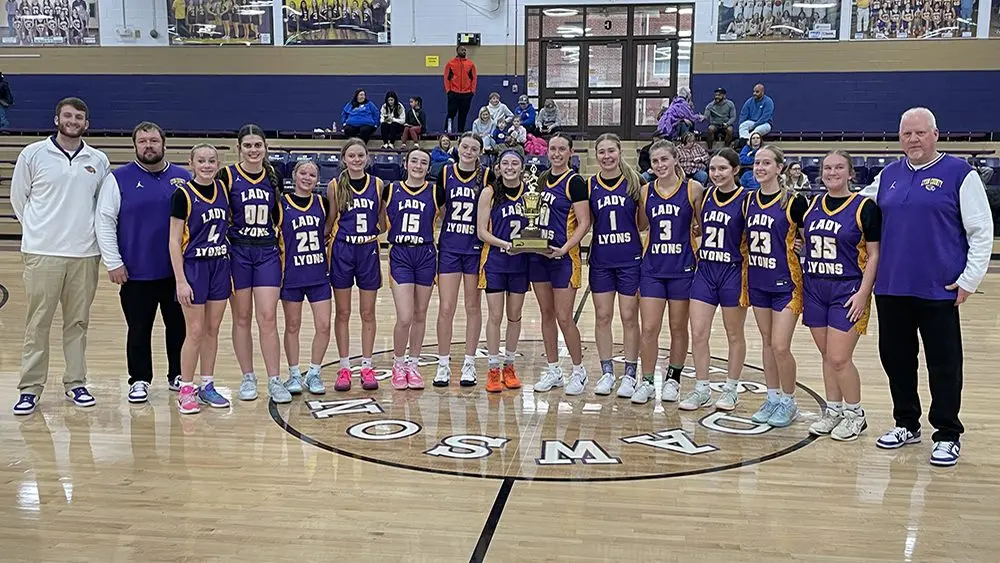 lady-lyons-with-trophy-2