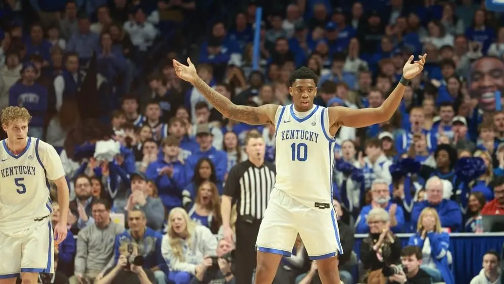 uk_player_arms_up_1000x563