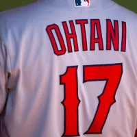 Shohei Ohtani of the Los Angeles Angels in the dugout at the Oakland Coliseum. August 10^ 2022: