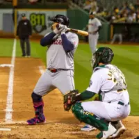 Oakland^ California - March 28^ 2024: Cleveland Guardians first baseman Josh Naylor bats against the Oakland Athletics on Opening Day at the Oakland Coliseum.