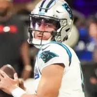 Carolina Panthers quarterback Bryce Young (9) warms up before the game against the Atlanta Falcons on January 5^ 2025 at Mercedes-Benz Stadium.