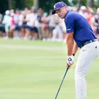 Bryson DeChambeau^ captain of Crushers GC^ chips on to the first green during the final round of LIV Golf Miami on April 6^ 2025 at Trump National Doral. DORAL^ FL - APR 6