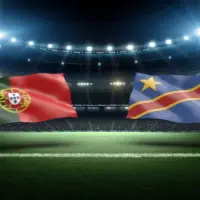 Football match preview between Portugal and DR Congo with national flags over a lit night soccer stadium background 3D rendering