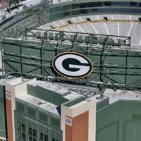 Feb 20^ 2025-Green Bay^ WI; An aerial view of Lambeau Field shows the iconic^ bowl-shaped stadium with its vast seating for 81^441 fans.