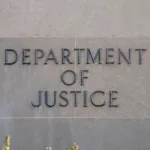 Sign at the Department of Justice in Washington^ DC.