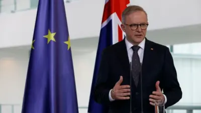 Australian Prime Minister Anthony Albanese is received with military honors by German Chancellor Olaf Scholz at the Federal Chancellery in Berlin.