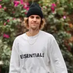 Justin Bieber enjoys a walk around his neighborhood. Los Angeles^ CA USA 02 27 2021