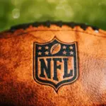 NFL logo on leather ball. Official ball of national football league. Panorama Format NEW YORK^ USA^ FEBRUARY 11^ 2023