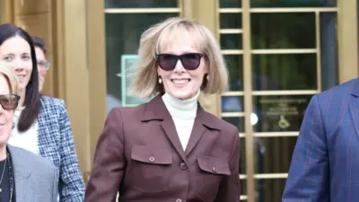 E. Jean Carroll smiles as she leaves the courtroom after a jury found former President Trump liable for sexual abuse and defamation. New York^ NY USA - May 9 2023