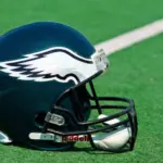 Philadelphia eagles NFL club helmet on the green playing field ^ product shot ZAGREB ^ CROATIA - 13 AUGUST 2015