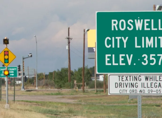 Highway sign for Roswell^ New Mexico