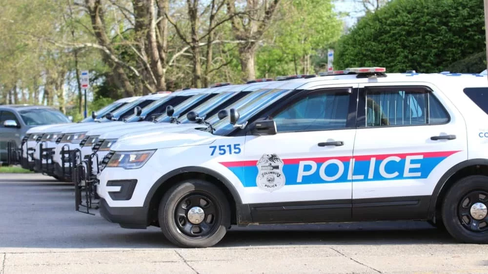 Columbus Ohio May 1^ 2022 A succession of police cars lined up in front of precinct.