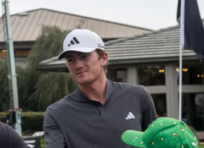 Nick Dunlap interacts with fans on the practice green at Bay Hill during the Arnold Palmer Invitational practice rounds. Orlando^ Florida^ USA - March 5th^ 2024