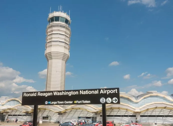 Control Tower^ National Airport seen from Metro Station platform. Ronald Reagan National Airport^ aka DCA^ is actually in Arlington^ three miles from DC. ARLINGTON^ VIRGINIA - OCT. 12^ 2017