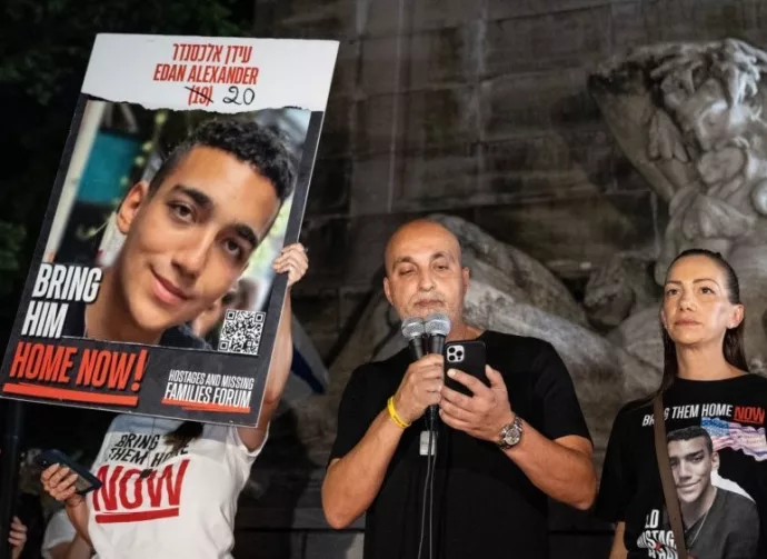 Adi Alexander speaks with Yael at his side^ parents of Edan Alexander at rally and memorial service for 6 hostages who were kidnapped and murdered by Hamas on Columbus Circle in New York on Sep 1 2024