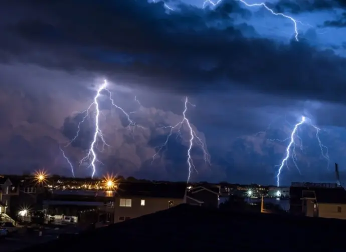 Four lightning bolt strike during a thunderstorm on Long Beach Island^ NJ.