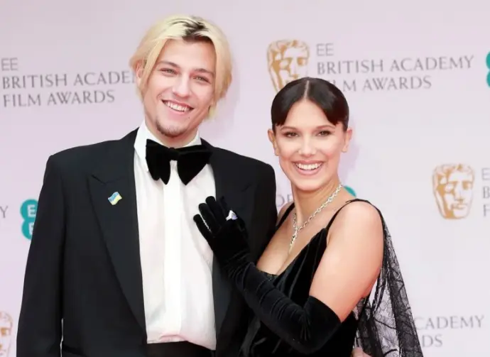 Millie Bobby Brown and husband Jake Bongiovi attend the EE British Academy Film Awards 2022 at Royal Albert Hall in London^ England. London^ United Kingdom - March 13^ 2022: