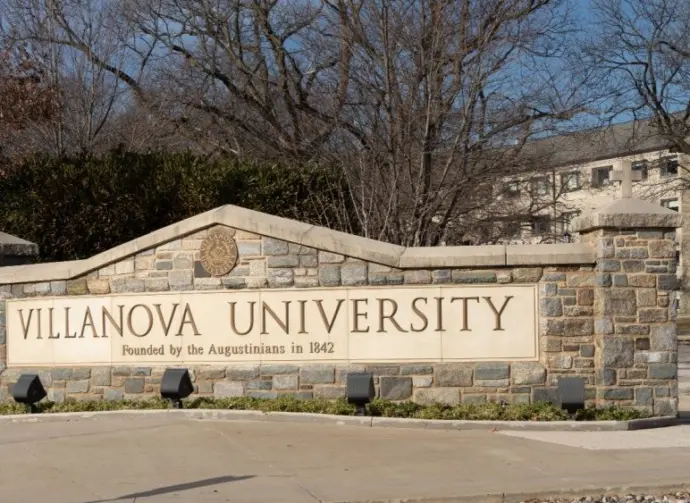 Villanova^ Pennsylvania: January 1^ 2022: Entrance Sign to Villanovia University. Villanovia is a private research university near Philadelphia^ Pennsylvania.
