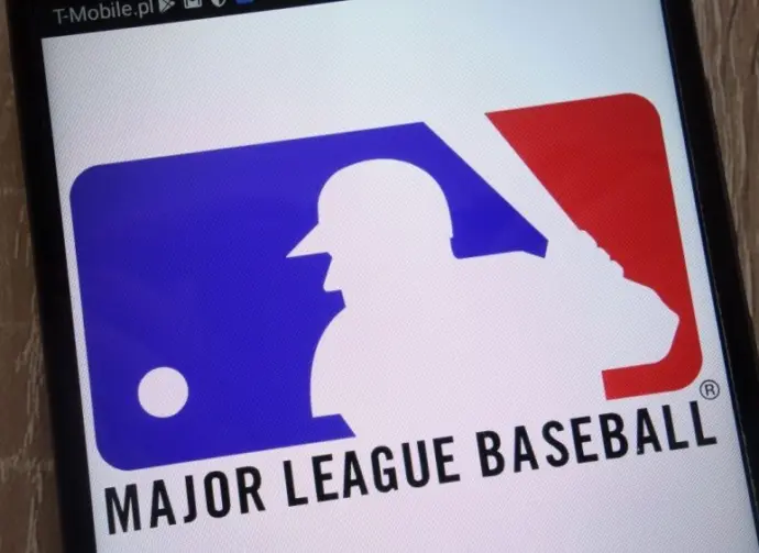 Major League Baseball logo displayed on a modern smartphone KONSKIE^ POLAND - SEPTEMBER 07^ 2018