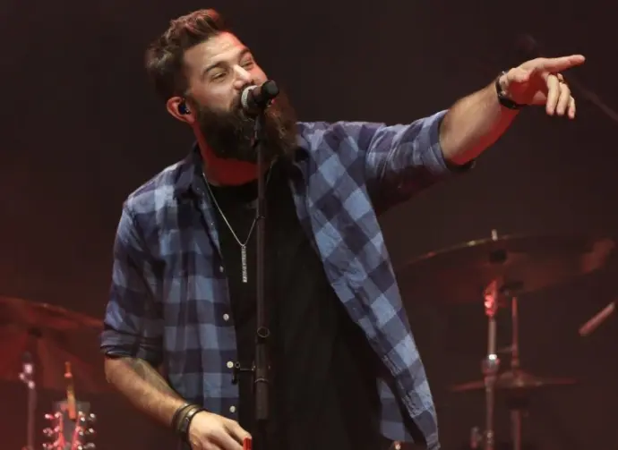 Jordan Davis performs at CMT's RAMJAM on June 3^ 2019 at TopGolf in Nashville^ Tennessee. NASHVILLE^ TN - JUN 3: