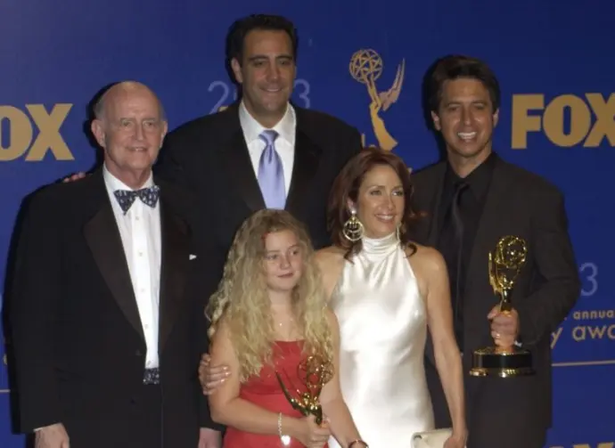 'Everybody Loves Raymond' stars PETER BOYLE (left)^ BRAD GARRETT^ MADYLIN SWEETEN^ PATRICIA HEATON & RAY ROMANO at the 55th Annual Emmy Awards in Los Angeles. Sept 21^ 2003