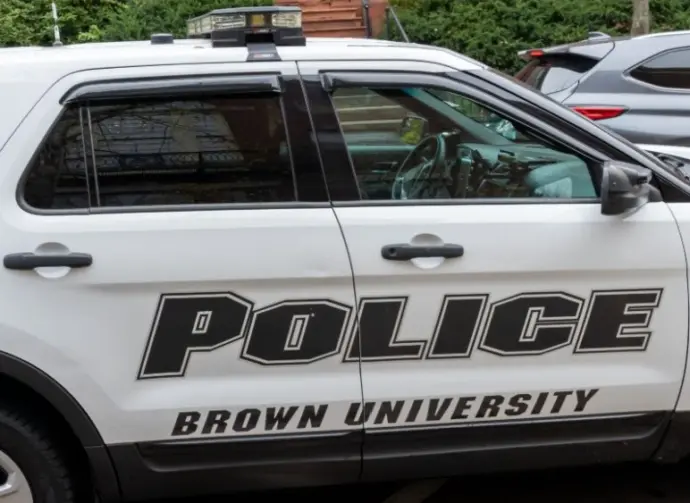 A police car in Brown University campus in Providence^ RI^ USA^ on November 10^ 2023. Brown University is a private Ivy League research university in Providence^ Rhode Island.