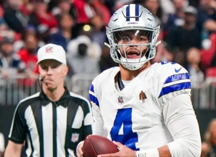 Dallas Cowboys quarterback Dak Prescott (4) looks to throw the ball against the Atlanta Falcons on November 3^ 2024 at Mercedes-Benz Stadium.