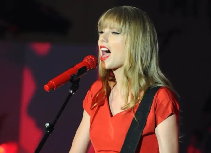Taylor Swift performs and turns on the Christmas Lights at Westfield Shepherd's Bush^ London. 06/11/2012