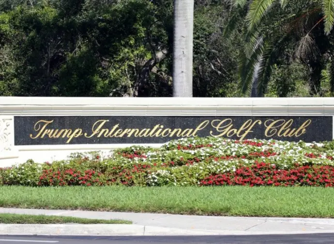 An Entrance to Trump International Golf Club in West Palm Beach^ Florida on April 25^ 2018. Trump International Golf Club is owned by President Donald J. Trump. WEST PALM BEACH^ FL^ USA - APRIL 25