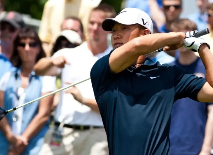 Golfer Anthony Kim tees off on the first tee while participating in the Travelers Championship on the TPC River Highland Golf Course June 27^ 2009 in Cromwell^ CT.