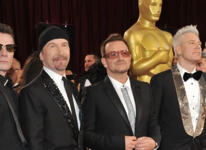 U2 with Bono & The Edge at the 86th Annual Academy Awards at the Hollywood & Highland Theatre^ Hollywood. LOS ANGELES^ CA - MARCH 2^ 2014