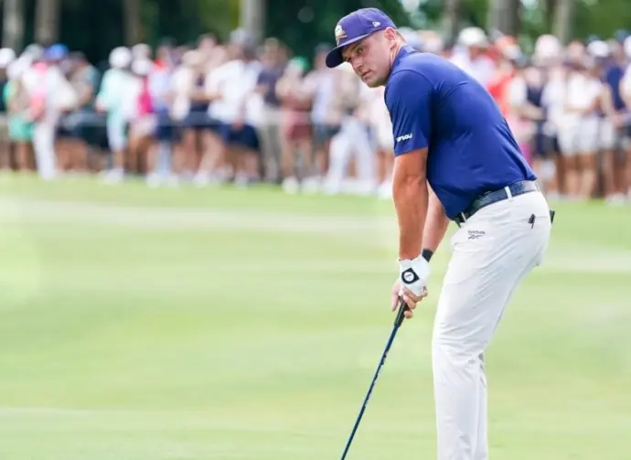 Bryson DeChambeau^ captain of Crushers GC^ chips on to the first green during the final round of LIV Golf Miami on April 6^ 2025 at Trump National Doral. DORAL^ FL - APR 6