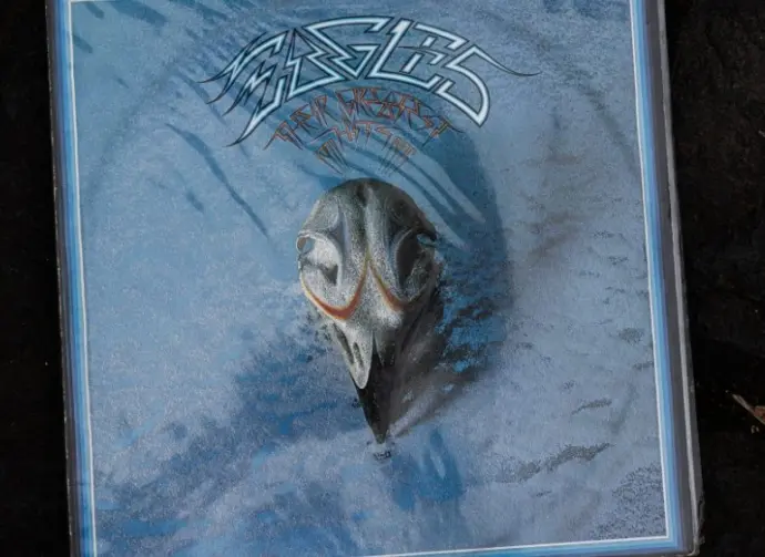 Vinyl cover art of Eagles Their Greatest Hits 1971-1975^ featuring rock music.