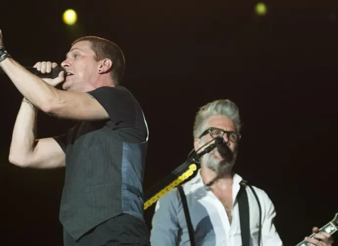 Matchbox 20 band vocalist Rob Thomas (L) performs during the Rock in Rio concert^ on September 20^ 2013 in Rio de Janeiro^ Brazil.
