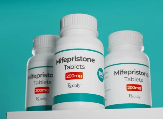 Mifepristone tablets in bottle. RU-486 Medical abortion pills. Used in combination with misoprostol. 3D illustration.