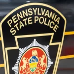 Pennsylvania State Police Trooper emblem on side of police vehicle Harrisburg^ PA / USA