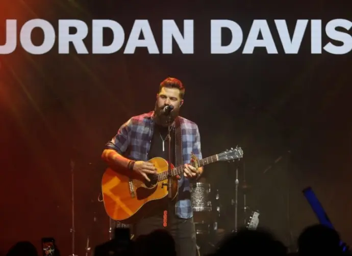 Jordan Davis performs at CMT's RAMJAM on June 3^ 2019 at TopGolf in Nashville^ Tennessee.