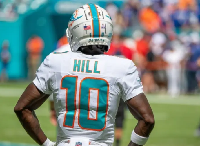 Tyreek Hill (10) (Miami Dolphins starting WR) stands on the sideline during pregame warmup. Miami Dolphins vs. NY Giants at HardRock Stadium. Miami Gardens^ FLUSA - October 08^ 2023